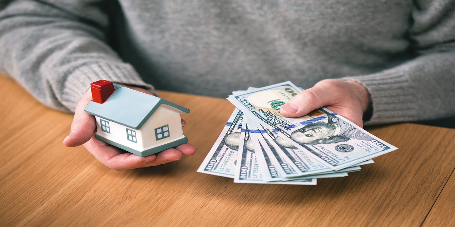 Person buying a house with cash